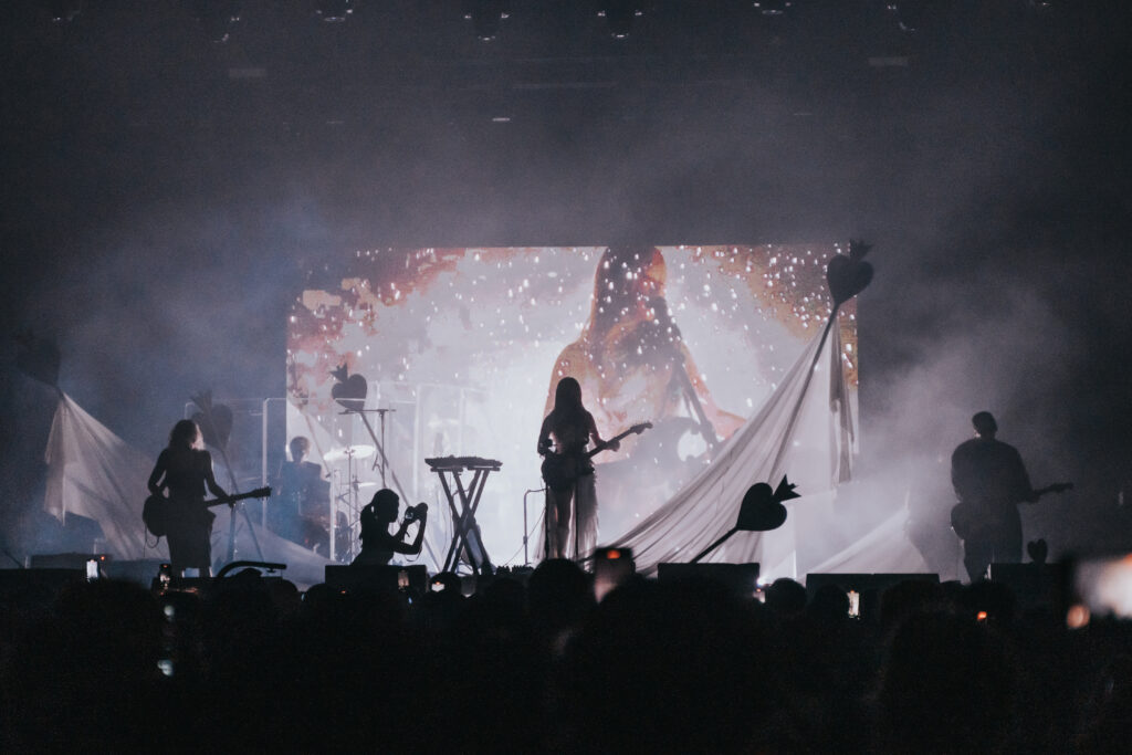 Creating a Dreamscape: Wisp’s Mythic Coachella set made with Superstudio 8 A photograph of Wisp performing at Coachella 2025
